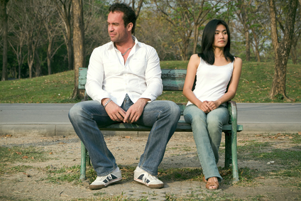 Man and woman sitting on a chair